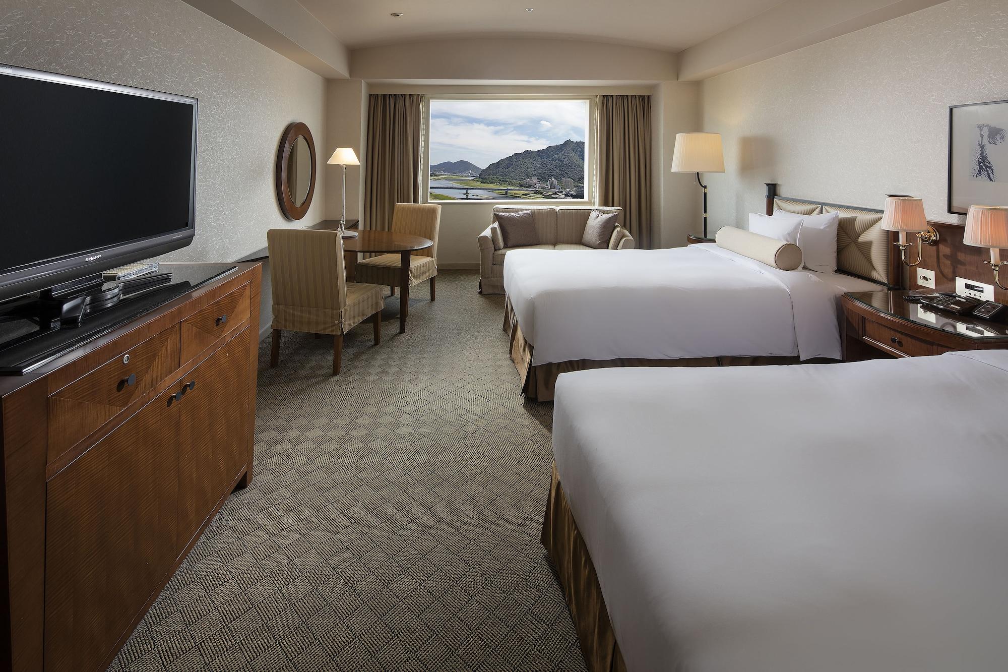 Miyako Hotel Gifu Nagaragawa Exterior foto A guest room at the Hilton San Francisco