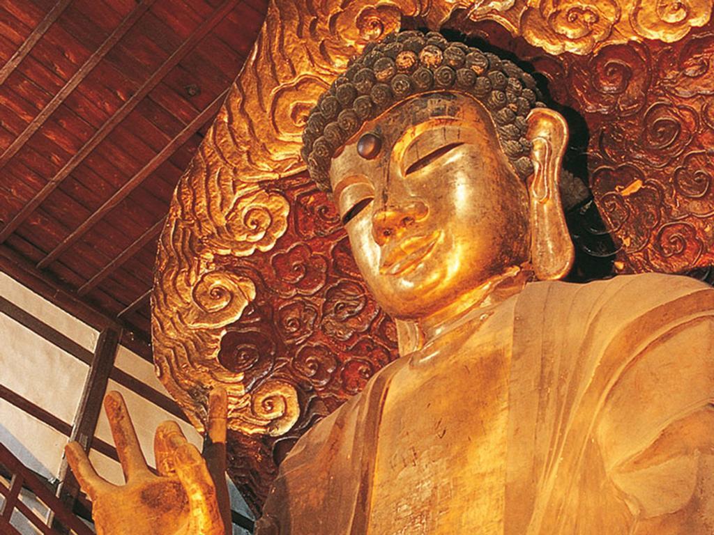Miyako Hotel Gifu Nagaragawa Exterior foto The 16-metre (52 ft) high reclining Buddha at the temple